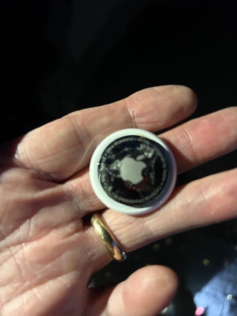 The back of an Apple Air Tag we detected 9/16/2025 from a customer's car